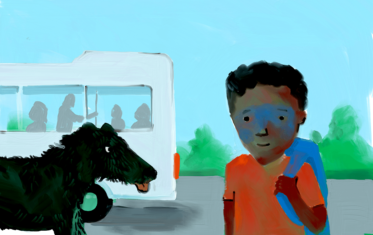 A boy, a dog and and a bus